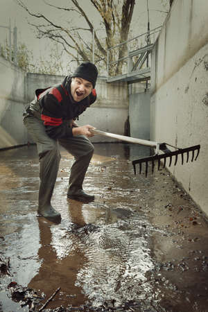 Worker during launching micro hydropower plant on small riverの写真素材