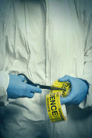 Criminologist technician sealing evidence from vacuum and micro filter