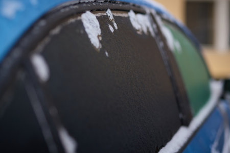 Details of cars frozen in calamity ice on street of European city Pragueの写真素材
