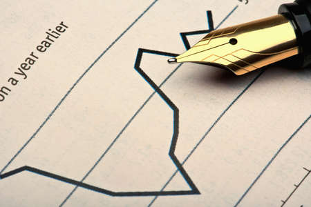 extreme closeup of a fountain pen and chartsの写真素材