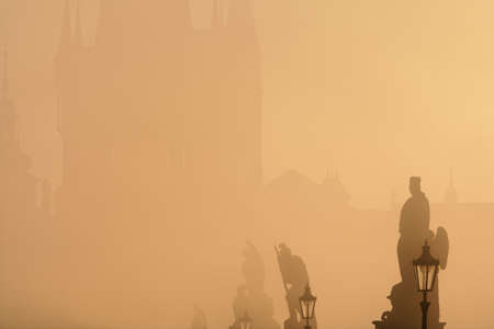 czech republic prague - charles bridge on foogy morningの写真素材