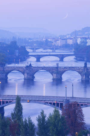 czech republic, prague - bridges over vltava river at morning lightの写真素材