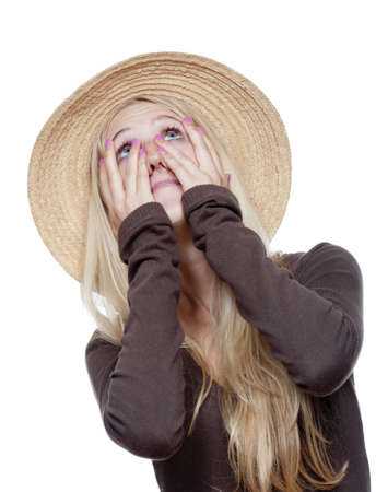 portrait of a young girl in straw hat - isolated on whiteの写真素材