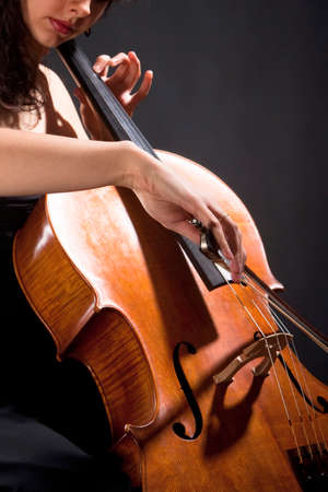 Closeup of a Female Musician Playing Violoncelloの写真素材