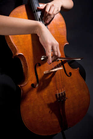 Closeup of a Female Musician Playing Violoncelloの写真素材