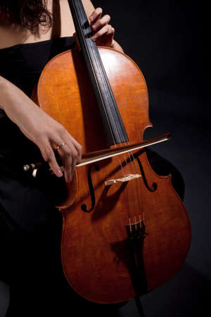 Closeup of a Female Musician Playing Violoncelloの写真素材