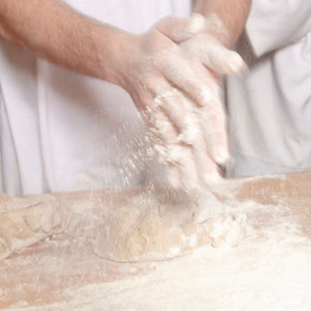 Professional Bakery - Baker Working with Dough 