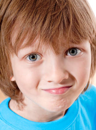 Portrait of a Boy with Blond Hair Looking - Isolated on Whiteの写真素材