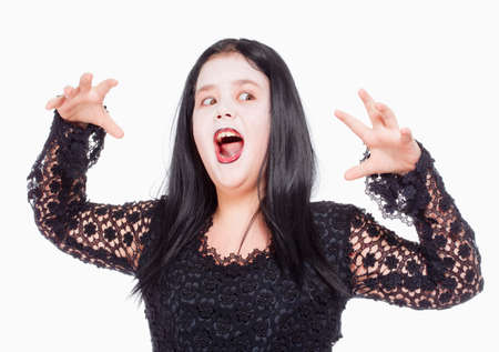 Little Girl Posing as a Member of Adams Familyの写真素材