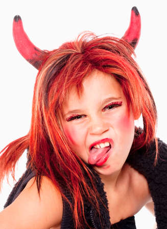 Portrait of a Young Girl in Wig Posing as a Devil