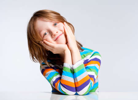 Portrait of a Boy with Blond Hair Smiling