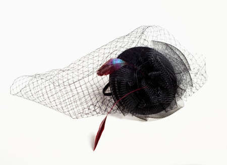 Black Teardrop Funeral Hat with Veil and Feathers.の写真素材