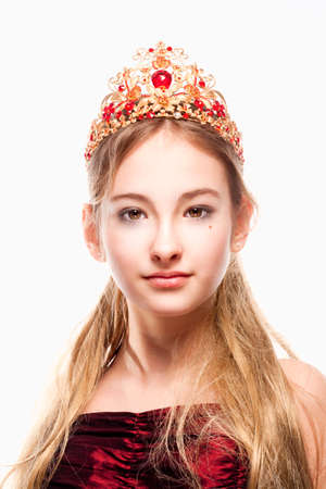 Girl with Blond Hair in Red Dress and Crown on her Headの写真素材