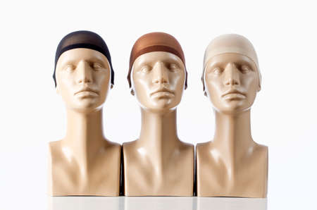 Three Mannequin Heads for Wigmaking on Whiteの写真素材