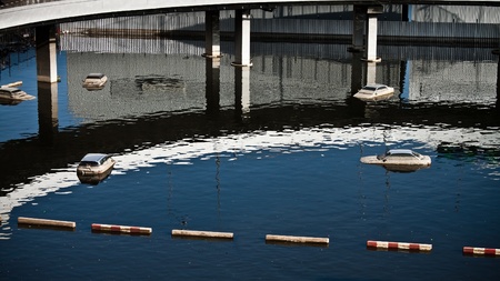 BANGKOK - NOVEMBER 16: Unidentified cars drown in water at Don Muang International Airport during the massive flood crisis on November 16, 2011 in Bangkok.のeditorial素材