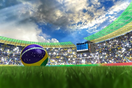 3D rendering of footballs in the year 2014 in a football stadiumの写真素材