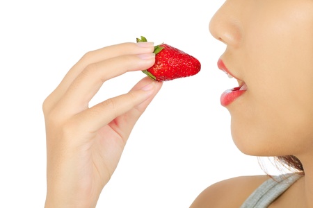 Closeup of Young Asian Woman with Strawberryの写真素材