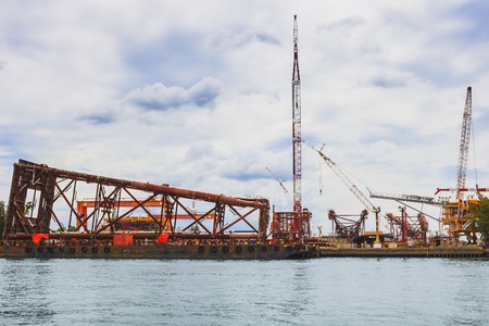 BANGKOK, THAILAND - JULY 12  Chao Phraya River in Bangkok, Thailand on Julyl 12, 2013  Ship yard along side of The Chao Phraya River is one of the most important industry in Thailand のeditorial素材
