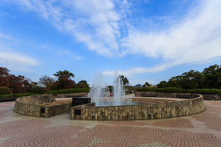 NAGASAKI, JAPAN - NOVEMBER 14  Nagasaki Peace Park in Nagasaki, Japan on November 14, 2013  Fountain of peace sprays water in shape of doveのeditorial素材