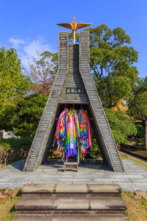 NAGASAKI, JAPAN - NOVEMBER 14: Nagasaki Peace Park in Nagasaki, Japan on November 14, 2013. Tower of Folded-Paper Cranes erected to console victims souls of the atomic bomb by hanging up paper cranes in tha towerのeditorial素材