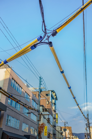 NARA, JAPAN - NOVEMBER 16  Electrical wiring in Nara, Japan on November 16, 2013  Special treated cover for electrical and telephone line wiring, protecting from weather at Sanjo dori streetのeditorial素材