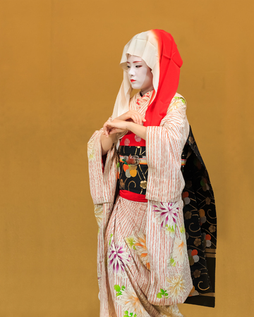 KYOTO, JAPAN - NOVEMBER 18  Kyomai Dance  in Kyoto, Japan on November 18, 2013  Unidentified Geisha performs Kyomai dance which adopted the elegance and of the imperial court mannerのeditorial素材