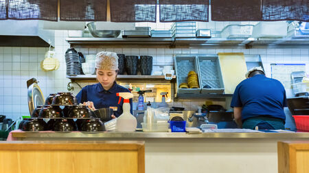 TOKYO, JAPAN - NOVEMBER 21  Sashimi Donbori in Tokyo, Japan on November 21, 2013  Unidentified Japanese Sashimi Donbori chef prepares a bowl of raw fish with rice for custumersのeditorial素材