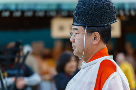 TOKYO, JAPAN - NOVEMBER 23  Wedding ceremony in Tokyo, Japan on November 23, 2013  Priests lead groom and bride in a traditional wedding ceremony at Meiji shrineのeditorial素材