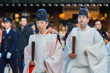 TOKYO, JAPAN - NOVEMBER 23  Wedding ceremony in Tokyo, Japan on November 23, 2013  Priests lead groom and bride in a traditional wedding ceremony at Meiji shrineのeditorial素材