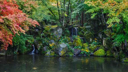 Small pond with tiny waterfall at Daigoji Temple in Kyoto