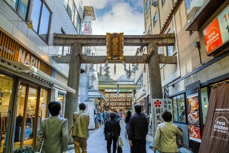 KYOTO, JAPAN - OCTOBER 23: Nishiki Tenmangu Shrine in Kyoto, Japan on October 23, 2014. Located in famous Teramachi shopping street in downtown Kyoto, the front side faces the famous Nishiki Market.のeditorial素材