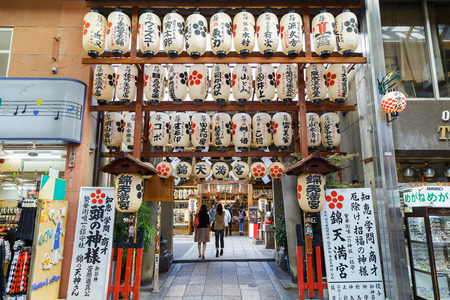 KYOTO, JAPAN - OCTOBER 23: Nishiki Tenmangu Shrine in Kyoto, Japan on October 23, 2014. Located in famous Teramachi shopping street in downtown Kyoto, the front side faces the famous Nishiki Market.のeditorial素材
