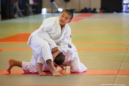 OSAKA, JAPAN - OCTOBER 25: Shudokan Hall in Osaka, Japan on October 25, 2014. Unidentified Japanese students attend the Judo class which is a traditional Matial art at Shudokan hallのeditorial素材
