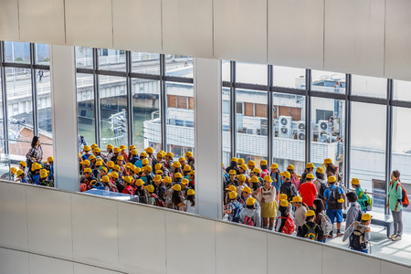 OSAKA, JAPAN - OCTOBER 28: Science Museum in Osaka, Japan on October 28, 2014. Unidentified group of Japanese students are on a field trip at Osaka Science Museumのeditorial素材