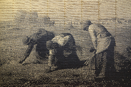 OSAKA, JAPAN - OCTOBER 29: Replica Paintings in Osaka, Japan on October 29, 2014. Reproduction of famous painting "The Gleaners" is created by Japanese train ticket and displayed at Kansai airport stationのeditorial素材