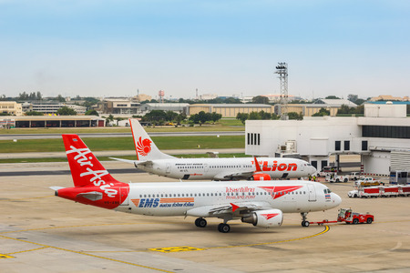 BANGKOK, THAILAND - OCTOBER 19: AirAsia in Bangkok, Thailand on October 19, 2014. Malaysian low-cost airline that operates domestic and international flights to 100 destinations spanning 22 countriesのeditorial素材