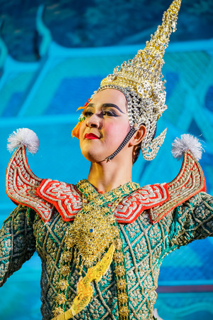BANGKOK, THAILAND - APRIL 12: Songkran Festival in Bangkok, Thailand on October 12, 2014. Khon (Thai traditional mask dance) performed in Songkran festival to calebrate Thai traditional new year's at Silom roadのeditorial素材