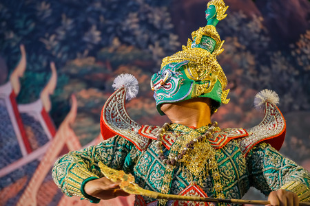 BANGKOK, THAILAND - APRIL 12: Songkran Festival in Bangkok, Thailand on October 12, 2014. Khon (Thai traditional mask dance) performed in Songkran festival to calebrate Thai traditional new year's at Silom roadのeditorial素材