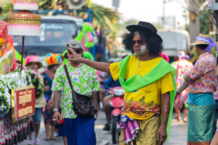 BANGKOK, THAILAND - APRIL 14: Songkran Festival in Bangkok, Thailand on October 14, 2014. Participants in a Songkran Festival parade which celebrated as Thai traditional New Year's at Silom roadのeditorial素材