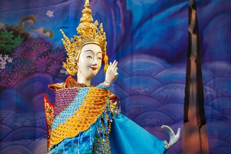 BANGKOK, THAILAND - APRIL 12: Songkran Festival in Bangkok, Thailand on October 12, 2014. Thai traditional  puppet performed in Songkran festival to calebrate Thai traditional new year's at Silom roadのeditorial素材