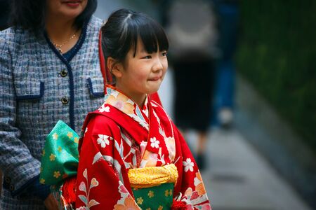 Nikko, Japan - November 17 2015: Parents and Children at Toshogu shrine in a Traditional rite of passage and festival day in Japan for 3 and 7-year-old girls and 3 and 5-year-old boysのeditorial素材