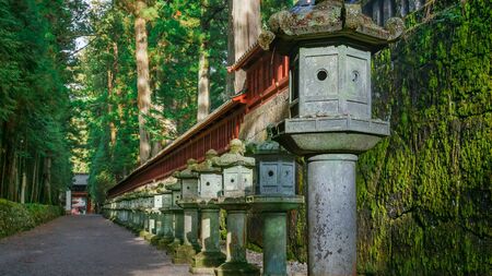 Stone Lanterns on the Side of Toshogu Shrine that lead to Futarasan Shrine in Nikko, Tochigi, Japan

NIKKO, JAPAN - NOVEMBER 17, 2015: Stone Lanterns on the Side of Toshogu Shrine that lead to Futarasan shrine located between Tosho-gu shrineのeditorial素材