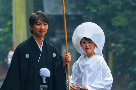 NAGOYA, JAPAN - NOVEMBER 18, 2015: Unidentified Japanese couple attends a Japanese traditional wedding ceremony at Atsuta-jingu shrineのeditorial素材