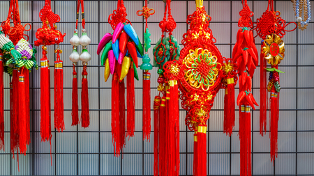 Chinese amulets put for sale on the side of a street at Yokohama Chinatown                                                                                                                                                 YOKOHAMA, JAPAN - NOVEMBER 24 2015: のeditorial素材