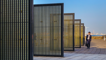 YOKOHAMA, JAPAN - NOVEMBER 24 2015: Yokohama Port has 10 major piers. In 2013, the Port served 37,706 ships. It handled 271,276,977 tons of cargo and 2,888,220 TEU containersのeditorial素材