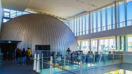 TOKYO, JAPAN - NOVEMBER 27 2015: The National Museum of Emerging Science and Innovation , known as the Miraikan literally Future Museum created by Japan's Science and Technology Agency