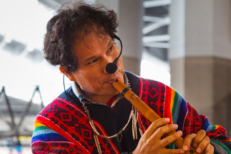 TOKYO, JAPAN - NOVEMBER 26 2015: Unidentified group of Peruvian Street Musicians perform traditional music for people at Uneno stationのeditorial素材