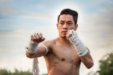 BANGKOK, THAILAND - FEBUARY 20: Unidentified Thai boxers perform a thai boxing dance in the celebration of the relation ship of Thailand and Republic of China in Lunar New Year festivalのeditorial素材
