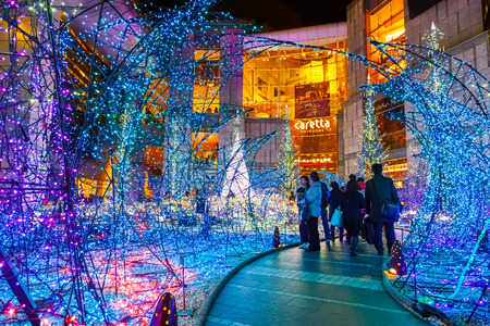 TOKYO, JAPAN - NOVEMBER 27 2015: Illuminations light up at at Caretta shopping mall in Shiodome district, Odaiba area. The illuminations' prepared for the forth coming Christmas Eveのeditorial素材