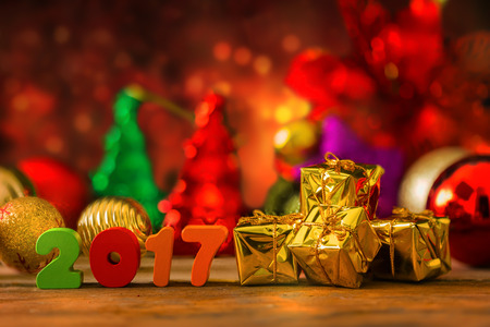Christmas and New Year Background With Miniature Shopping Cart with Decorations